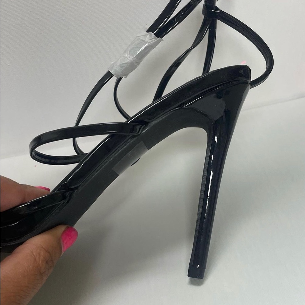 Size 8 1/2 Black Strappy high heels.